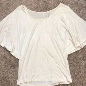 Shiny cream colored blouse. From New York & Co